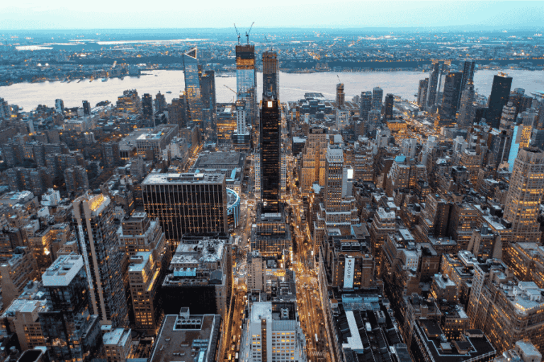 Aerial view of Midtown Manhattan at dusk, representing Drone Inspect NYC’s urban inspection coverage area