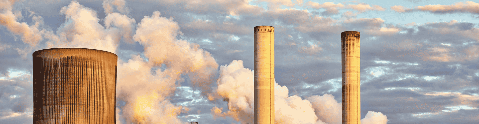 Drone image of smokestacks at an industrial energy facility during inspection